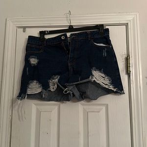 These shorts are Chelsea and Violet from Dillards. They’re a dark blue denim.